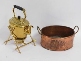 A polished brass spirit kettle, lacking burner twi