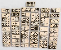 An antique ebony & bone domino nines set with fift