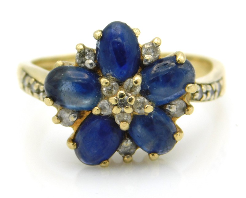 A 9ct gold ring set with sapphire & diamond, missi