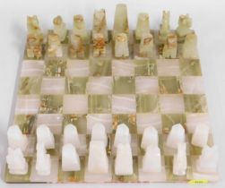 An onyx chess set & pieces, king 2.5in tall, board 11in square