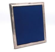 A 1993 Sheffield silver photo frame by Carrs, some
