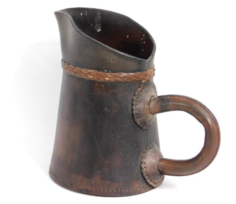 A leather bombard pitcher, 8.25in tall