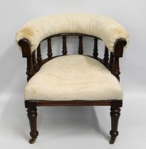 An antique upholstered armchair, 30in high to back