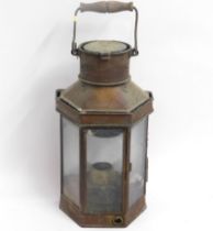 A copper lantern with brass wall hook to rear, 20i