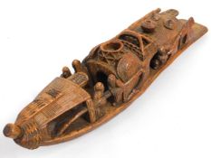 A detailed late 19thC. Chinese carved bamboo boat,