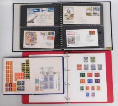 A first day cover album, approx. 32 including Concorde twinned with a small stock book of mint stamp