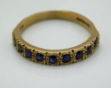 A 9ct gold half eternity ring set with sapphire, 2