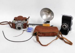 A Kodak 35 camera twinned with an Ensign camera &