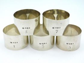 A set of five 1923 London silver napkin rings by R