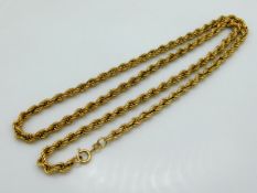 A 24in long 9ct gold rope chain, 11.8g