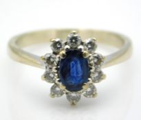 A white gold ring set with sapphire & approx. 0.2ct diamond, main stone 6.25mm x 4.25mm, tests elect