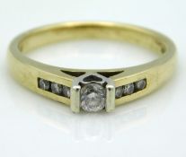 A 9ct gold ring set with small diamonds, 2.8g, siz