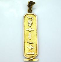 A yellow metal Nefertiti pendant with foreign mark