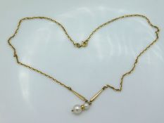 A 16in long 9ct gold necklace set with diamond & p