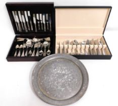 A canteen of plated cutlery, one stainless steel &