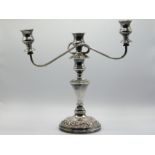 An antique silver plate on copper candelabra, 13.5