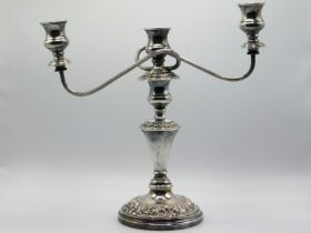 An antique silver plate on copper candelabra, 13.5
