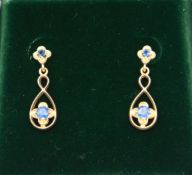 A pair of 9ct gold sapphire earrings, drop 24mm, 2.4g