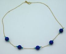 A Zoe B 14ct gold necklace set with lapis lazuli &