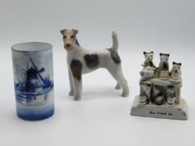 A Royal Copenhagen porcelain dog, 4.75in tall, a D