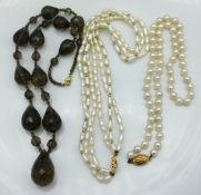 A smokey quartz necklace, a freshwater pearl neckl