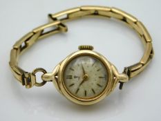 A 9ct gold cased ladies Tudor Rolex, loss of 'or'