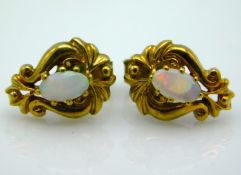 A pair of 9ct gold opal earrings, 11mm drop, 1.4g