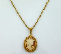 A 17in long 9ct gold chain with 9ct gold cameo pen