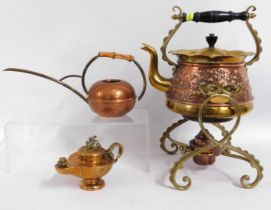 An embossed copper & brass spirit kettle twinned w