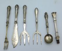 Five silver handled items including a small 1902 S