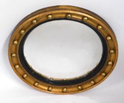 A 19thC. convexed porthole mirror, 17.5in diameter