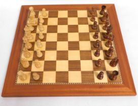A 19.25in square inlaid chess board with weighted