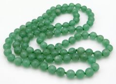 A jade necklace, 32in long, 71g