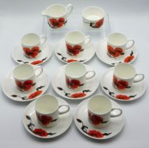 Eight Wedgwood Susie Cooper 'Corn Poppy' coffee cu