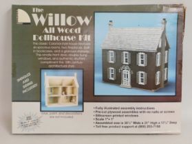 A boxed 'The Willow All Wood Dolls House Kit'