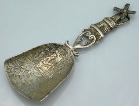 A 1908 London silver caddy spoon with windmill dec