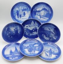 Eight Royal Copenhagen porcelain Christmas year pl