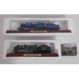 Two Atlas Edition model trains, sealed