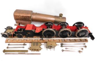 A part built steam locomotive model, rail measures