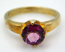 A 9ct gold ring set with pink topaz, 3.6g, size O