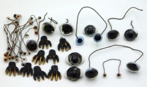 A selection of antique taxidermy glass eyes & feet