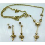 A 9ct gold necklace set with small diamond set in