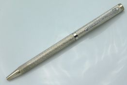 A sterling silver ball point pen with diamond chip, 13.8g