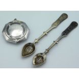 Two white metal spoons with filigree work bowls tw