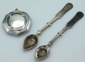 Two white metal spoons with filigree work bowls tw