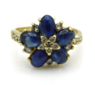 A 9ct gold ring set with sapphire & diamond, missi