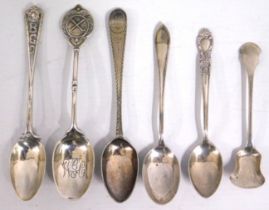 A Sheffield silver hockey spoon with inscription 'Presented to Theo D. Jones, Jan 1st 1924' twinned