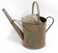 A galvanised steel watering can from RAF Croft, st