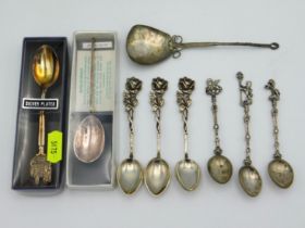 Six silver spoons twinned with two packaged plated