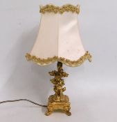 A gilded cherub lamp, 13.25in tall inclusive